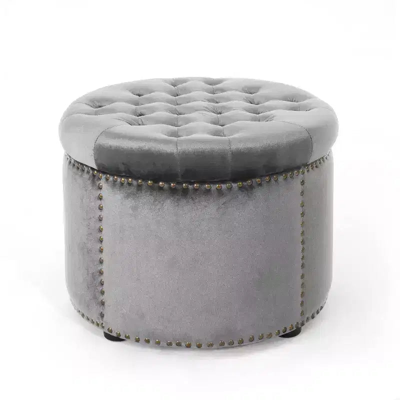 Ottoman rond contemporain en velours capitonné avec garniture cloutée