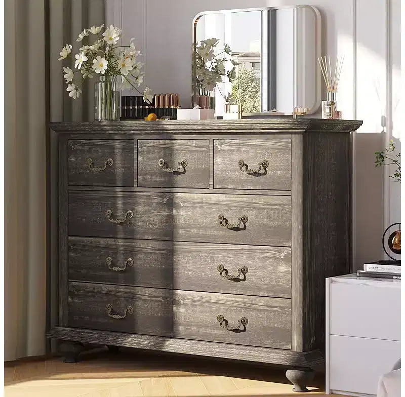 Bedroom vanity with intricately carved metal handles, featuring a tall cabinet with wooden legs. Suitable for bedrooms, living rooms, and hallways.